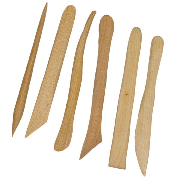 Six wooden tools for sculpting.