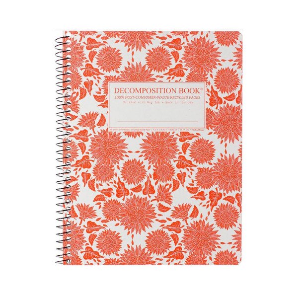 This is a spiral bound composition book. The text on the cover is bright orange. The cover is white with bursts of bright orange sunflowers and foliage.