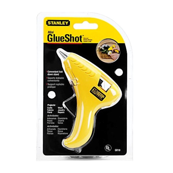 Stanley yellow mini hot glue gun in plastic packaging.