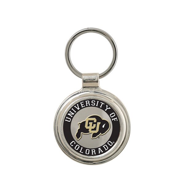 A metal circular keychain with a keyring, featuring University of Colorado in rounded lettering, surrounding a C-U Buffalo logo.