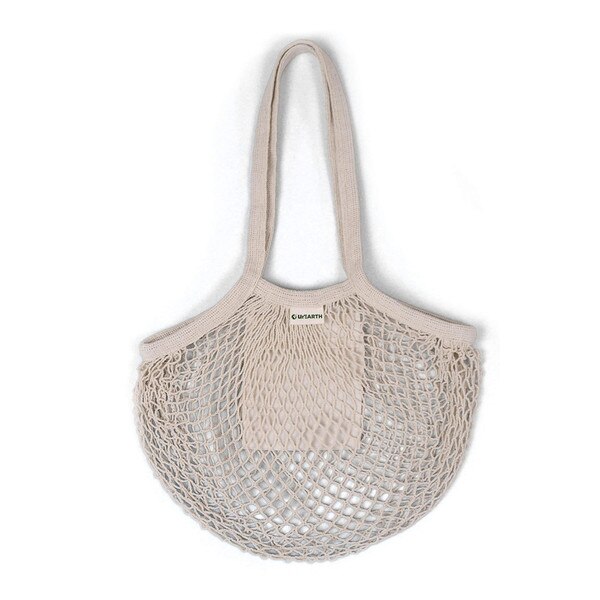 A cream-colored organic cotton netted bag with two shoulder straps, and with a small unEarth logo on a tag near the top.