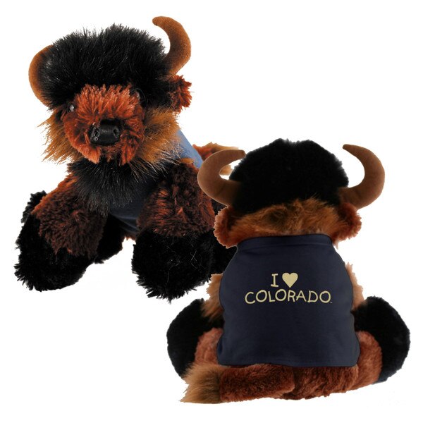 This is a plush buffalo. It's fur is mainly brown, but has black feet and a black patch of fur on its head. The shirt it wears is black, and the text on the back is gold. The heart is a heart doodle.