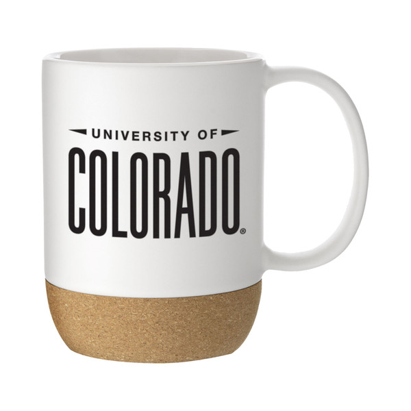 A white ceramic mug with a cork bottom, proudly displaying University of Colorado in black lettering.