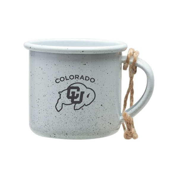 A white paint speckled miniature mug ornament with arched Colorado lettering and a CU Buffalo logo on it tied together with a string for hanging.
