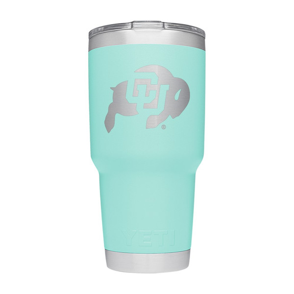 A mint colored Yeti tumbler with the Colorado Buffaloes logo on the front in steel.