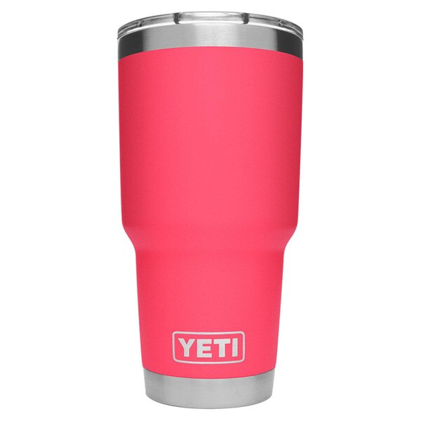 The backside of a pink Yeti tumbler with the Yeti logo on the bottom in steel.