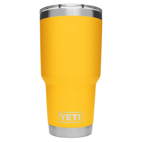 The backside of a yellow Yeti tumbler with the Yeti logo on the bottom in steel.