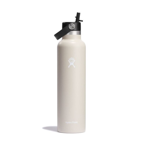An oatmeal colored 24 ounce stainless steel Hydroflask water bottle with straw lid and handle strap.