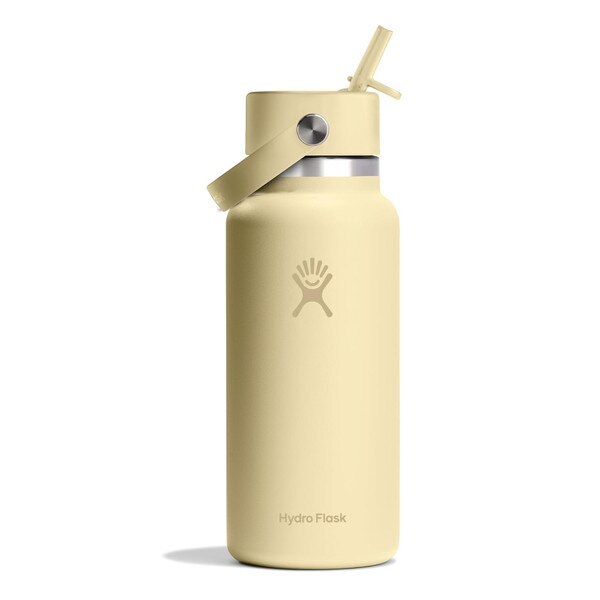 A starlight blue 32 ounce stainless steel Hydroflask water bottle with straw lid and handle strap.