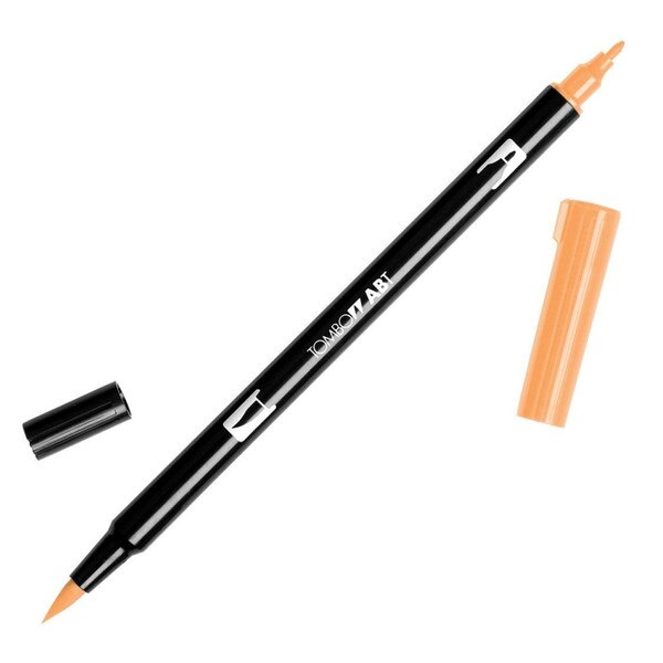 This is a dual-end marker pen with both fine point and brush-like tips. The marker is a peachy color.