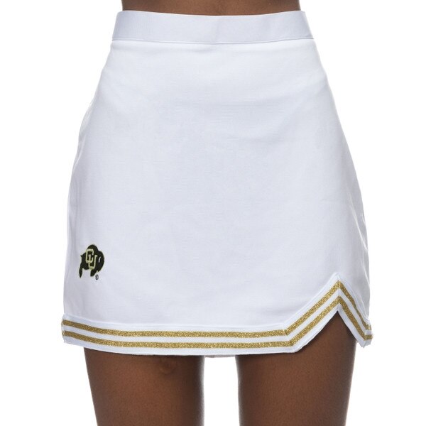 A white skirt with the CU buffalo logo on the right lower side and double glittery vegas gold stripes across bottom edge with upper v cutout on left bottom edge.