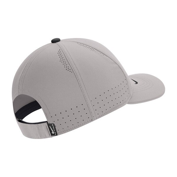 The back of a gray moisture-wicking Nike youth Hat. There is a velcro adjustable strap.