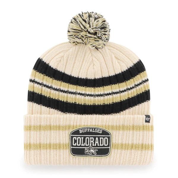 A cream beanie with black and Vegas Gold stripes and a multi-colored pom-pom on top, featuring a Colorado Buffaloes patch on the front.