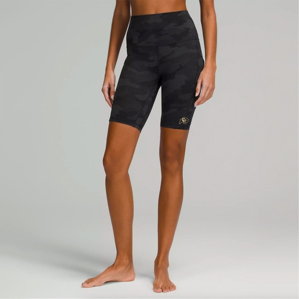 Dark gray camo printed lululemon biker shorts with the CU Buffalo logo on the bottom of the left leg.