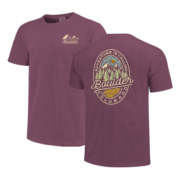 A purple t-shirt that says "Boulder" on the front left chest and has a mountain scene with "Adventure is Calling," "Colorado," and "Boulder" written on the back.