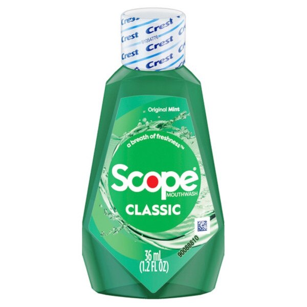 36 milliliter bottle of Crest scope mouthwash in original mint flavor.