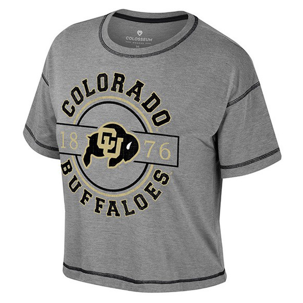 A grey cropped t-shirt with the CU buffaloes logo inbetween 1876, encircled by a pattern with "Colorado" on top and "Buffaloes" around the bottom. The shirt is accented with black seams.