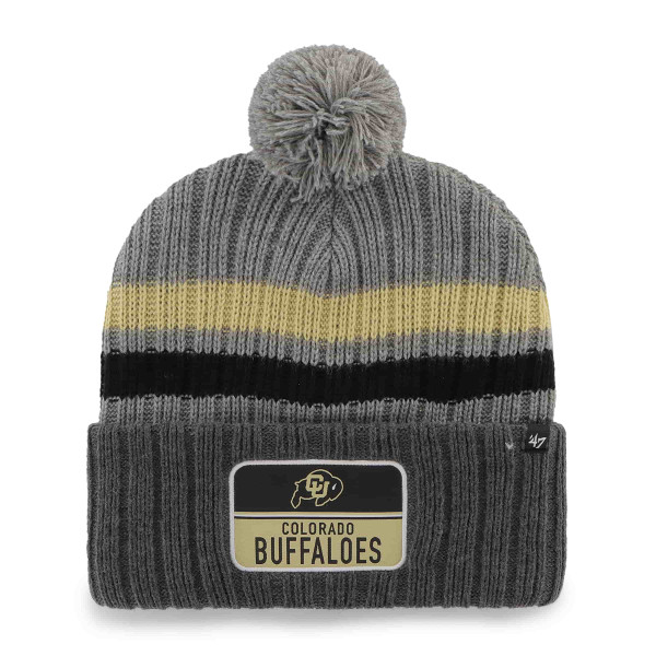 A black, gray, and Vegas Gold striped beanie with a gray fuzzy pom-pom on top, featuring a Colorado Buffaloes patch on the front.