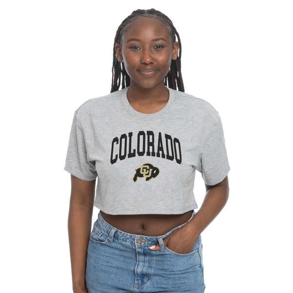 This is a grey, short sleeve, crop top. Colorado is arched in bold text. The underneath C.U. Buffalo logo is black and Gold.