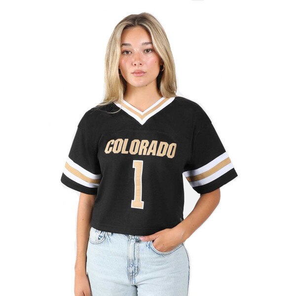 This is the front of the jersey. "Colorado" is gold with gold outlining. The one is gold with a white outline. The stripes on the sleeves and collar are white with a gold one in the center.