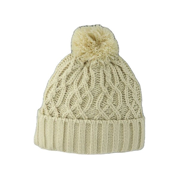 The white of a black cable knit beanie with a white pom on top.