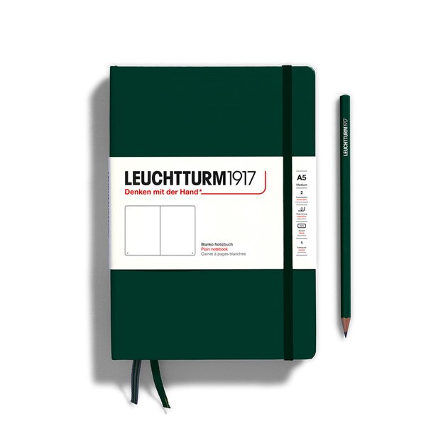 A forest green colored hardcover notebook.