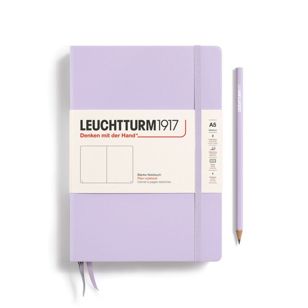 A lilac colored hardcover notebook.