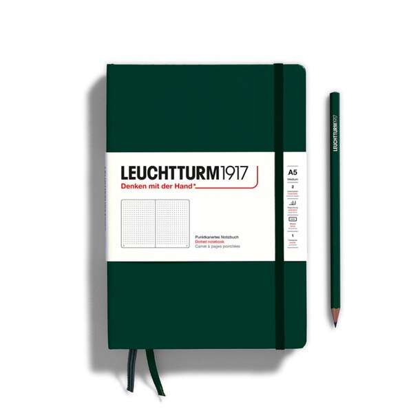 Forest green hardcover dotted notebook with closure strap and two bookmarks.