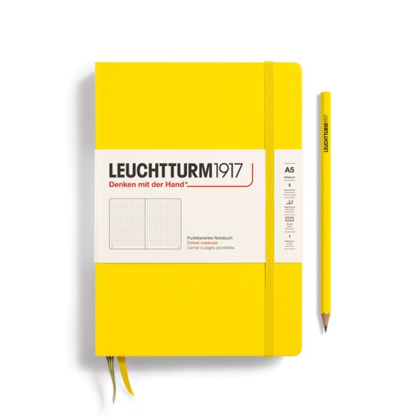 Lemon hardcover dotted notebook with closure strap and two bookmarks.