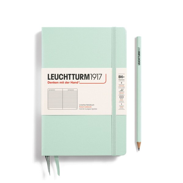 Mint green hardcover ruled notebook with 2 bookmarks, with thin fabric strap closure.