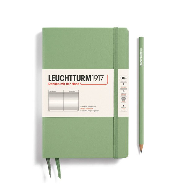 Sage green hardcover ruled notebook with 2 bookmarks, with thin fabric strap closure.