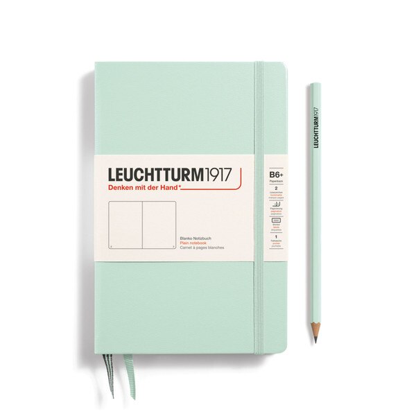 Mint hardcover blank notebook with 2 bookmarks, with thin fabric strap closure.