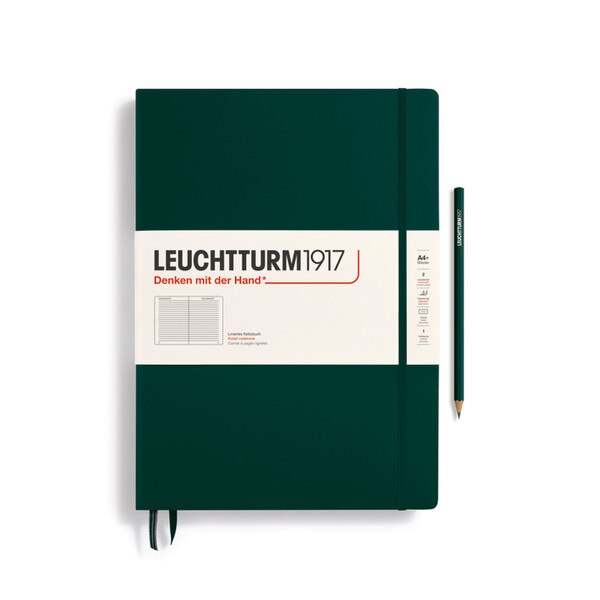 A forest green colored hardcover notebook.