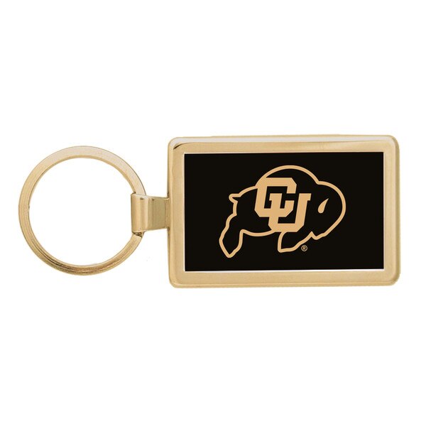 A gold framed Spirit Products keychain with C.U buffalo logo.