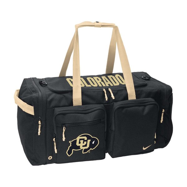 Black duffel bag with gold “Colorado” text on top, CU Buffaloes logo on front pocket, gold handles and zippers, and Nike swoosh on lower right front.