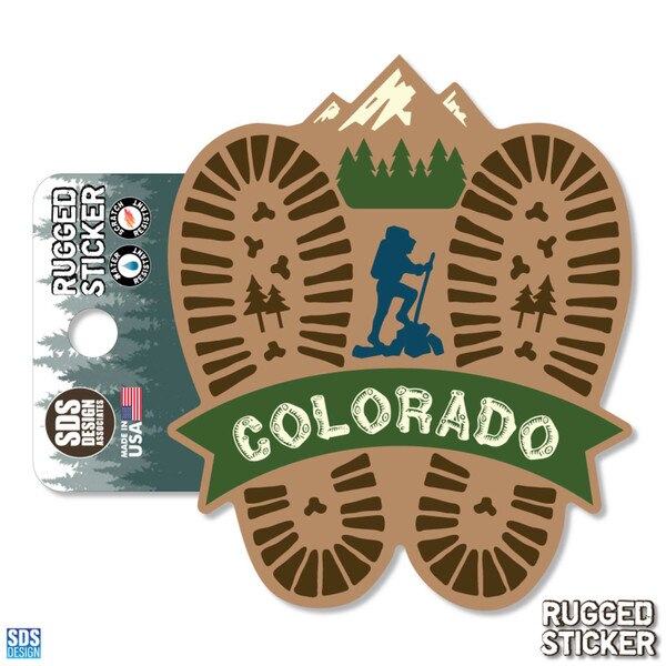 Colorado hiking sticker with boot prints, mountain scene, and hiker silhouette