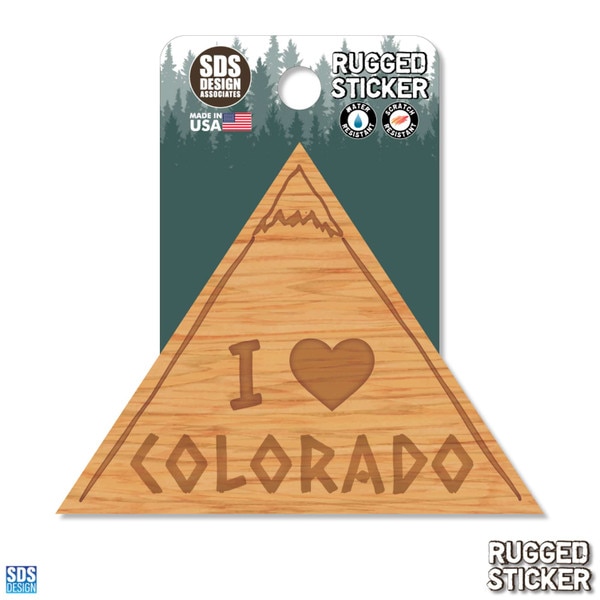 I Heart Colorado rugged sticker shaped like a wooden mountain, with engraved-style lettering and heart graphic.
